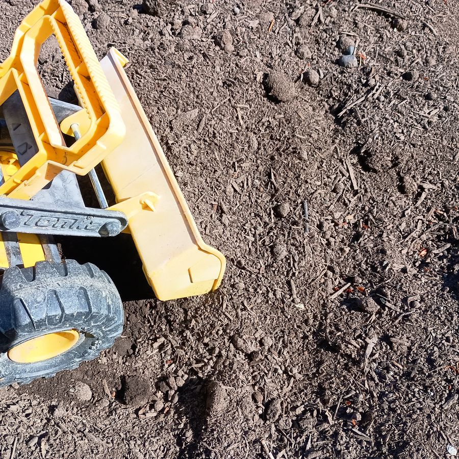 Screened topsoil in the loader bucket